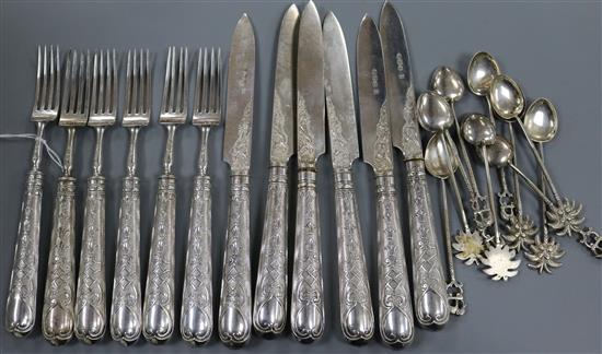 Two sets of three pairs of late Victorian silver dessert eaters and and ten assorted Indian? spoons.